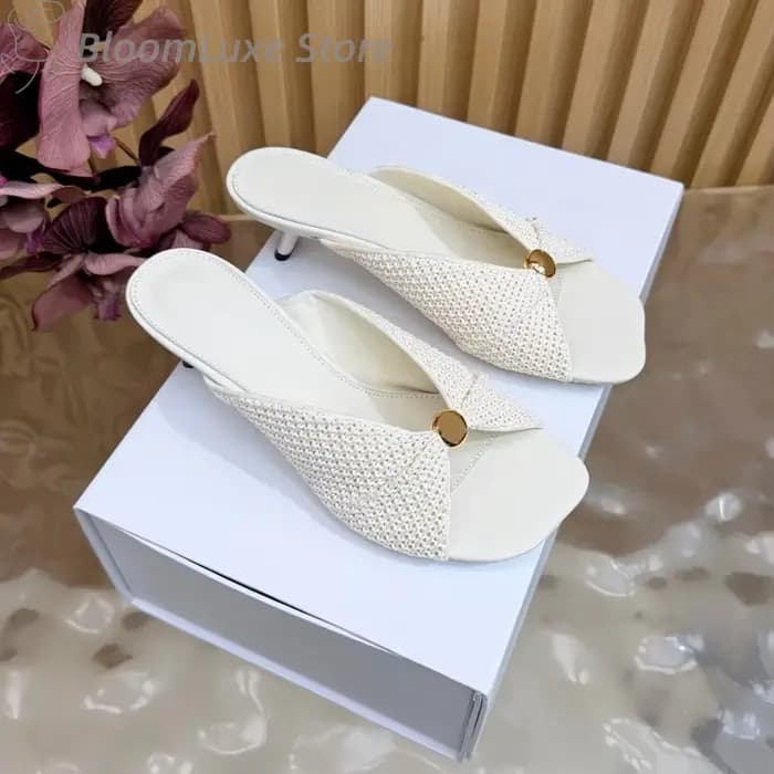 Mules tissées en raphia torsadé pour femme