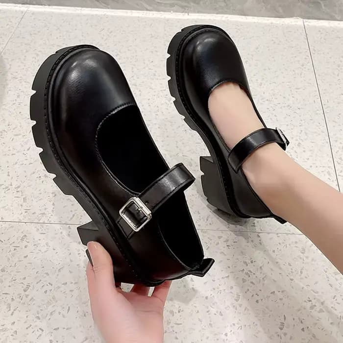 Escarpins à plateforme noirs en cuir verni pour femmes
