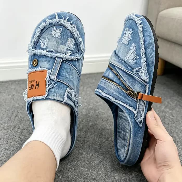 Mules en denim bleu clair avec bords effilochés
