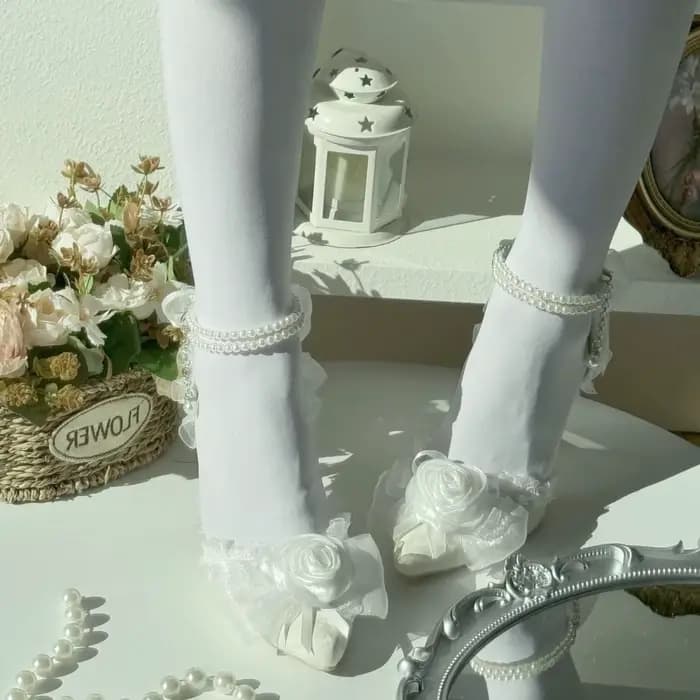 Chaussures de mariée blanches à talons hauts