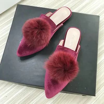 Femmes Mules bout pointu troupeau cuir grande boule de fourrure 2025 printemps été pantoufles élégantes